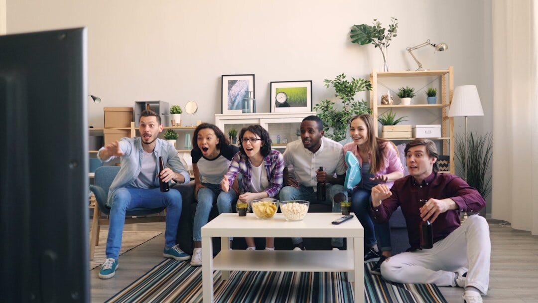 Diverse team of TV studio staff having a calm meeting